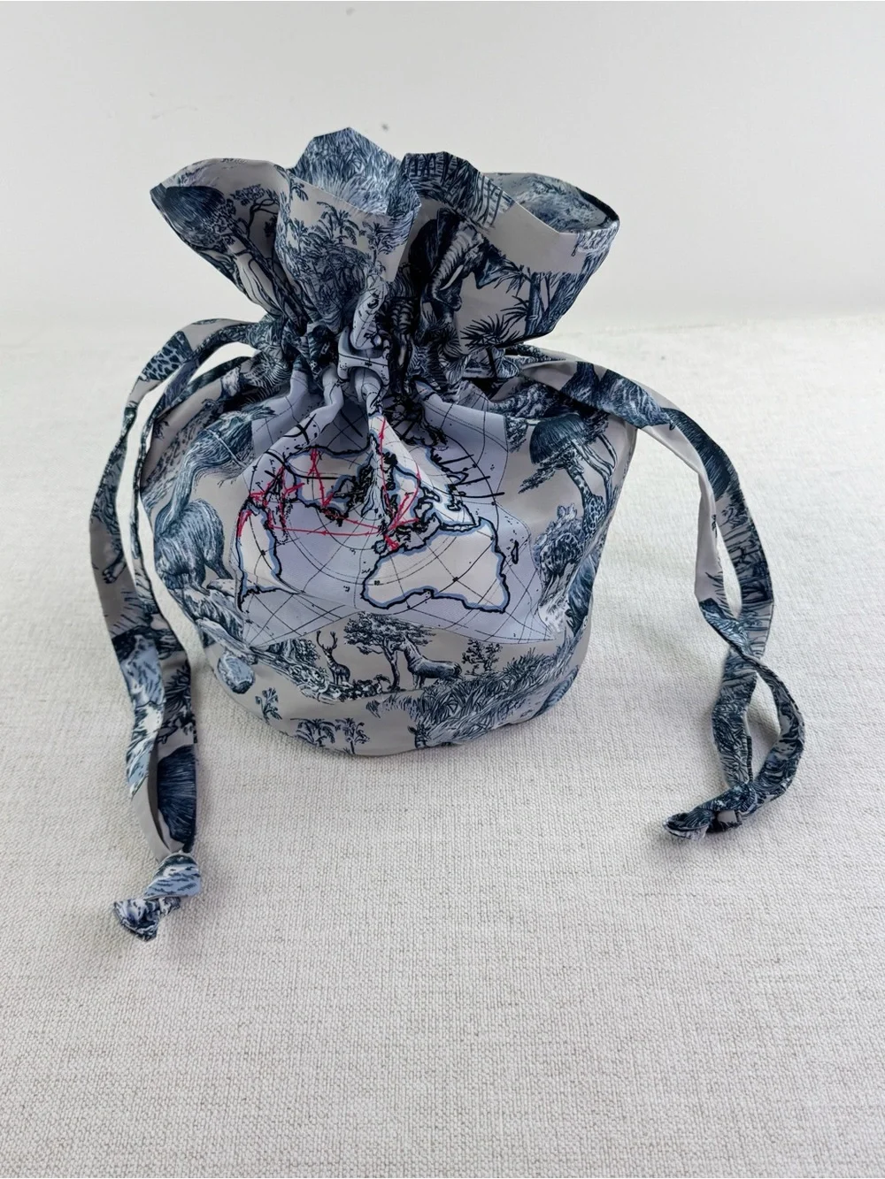 Dior Around the world make up pouch drawstring in blue